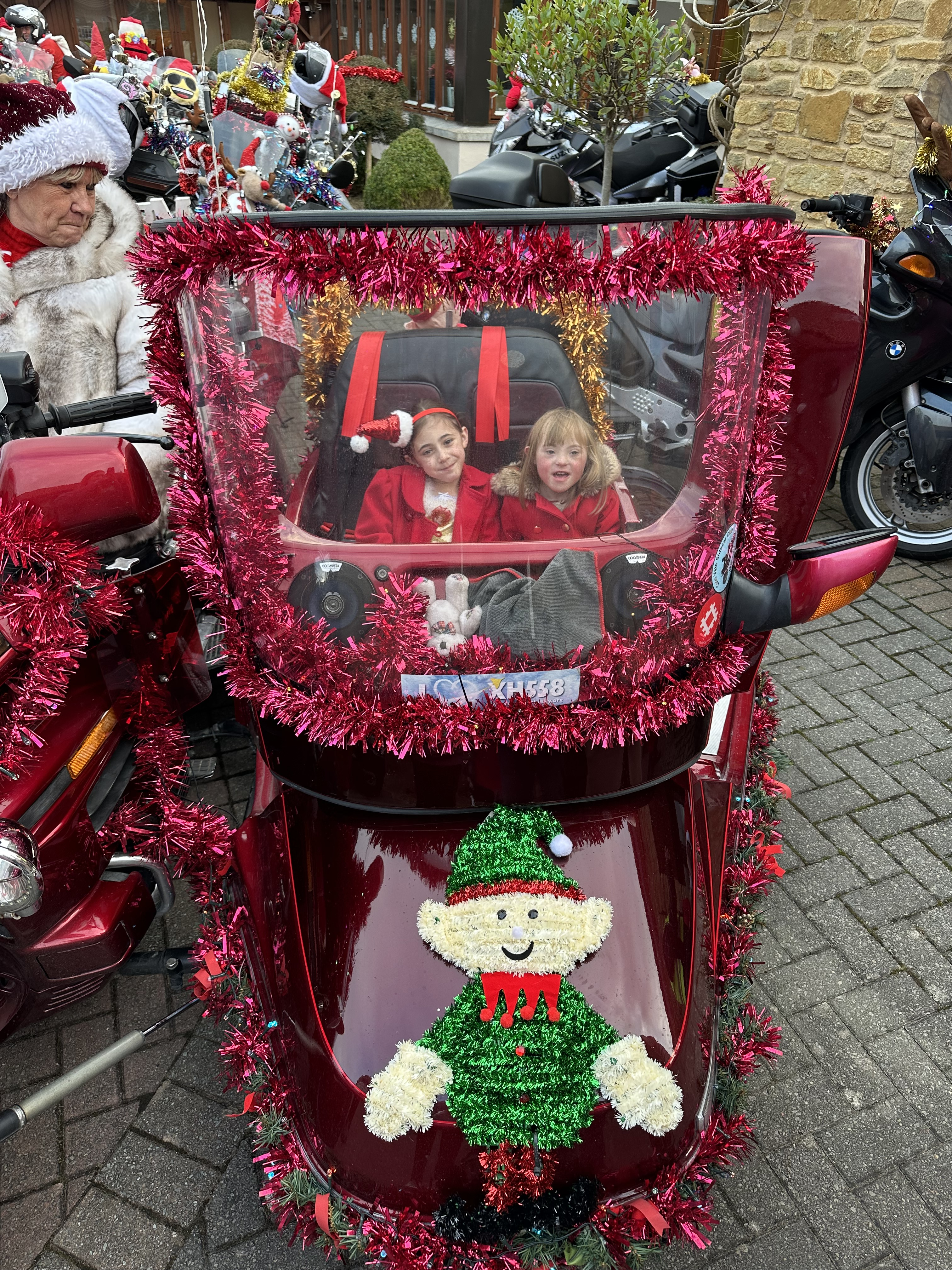 Esme with her sister at Little Bridge House at Christmas